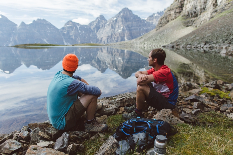 People enjoying the lake view while hiking